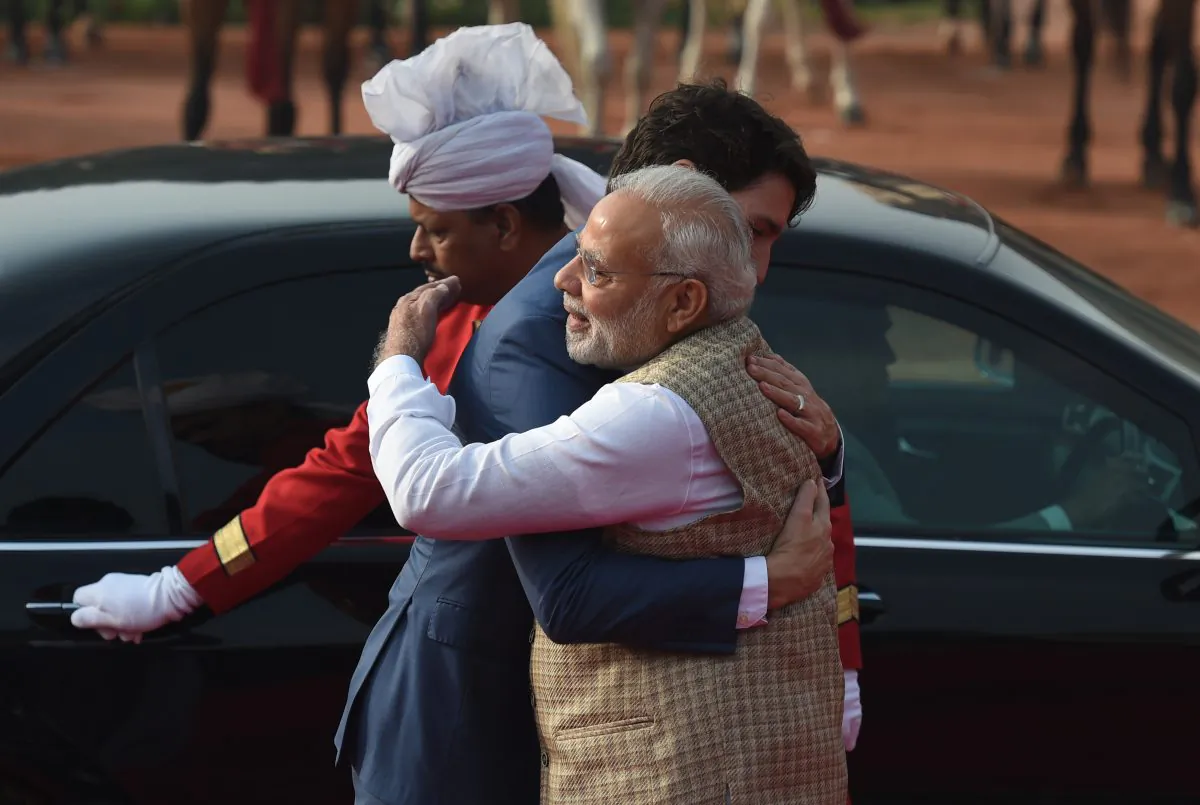 India's Prime Minister Narendra Modi (R) embraces Canada's Prime Minister Justin Trudeau during a ceremonial reception at the Presidential Palace in New Delhi on Feb. 23, 2018.
(Prakash Singh/AFP/Getty Images)