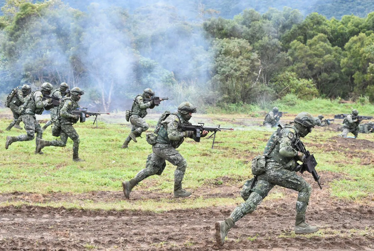 Soldiers stage an attack during an annual drill at the military base in the eastern city of Hualien, Taiwan, on Jan. 30, 2018. (Mandy Cheng/AFP/Getty Images)