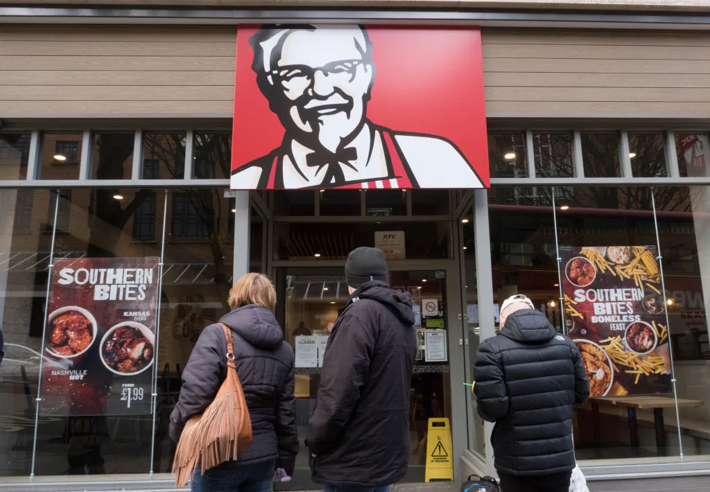 People look into a branch of KFC that is closed owing to problems with the delivery of chicken on Feb. 20, 2018 in Bristol, England. (Matt Cardy/Getty Images)