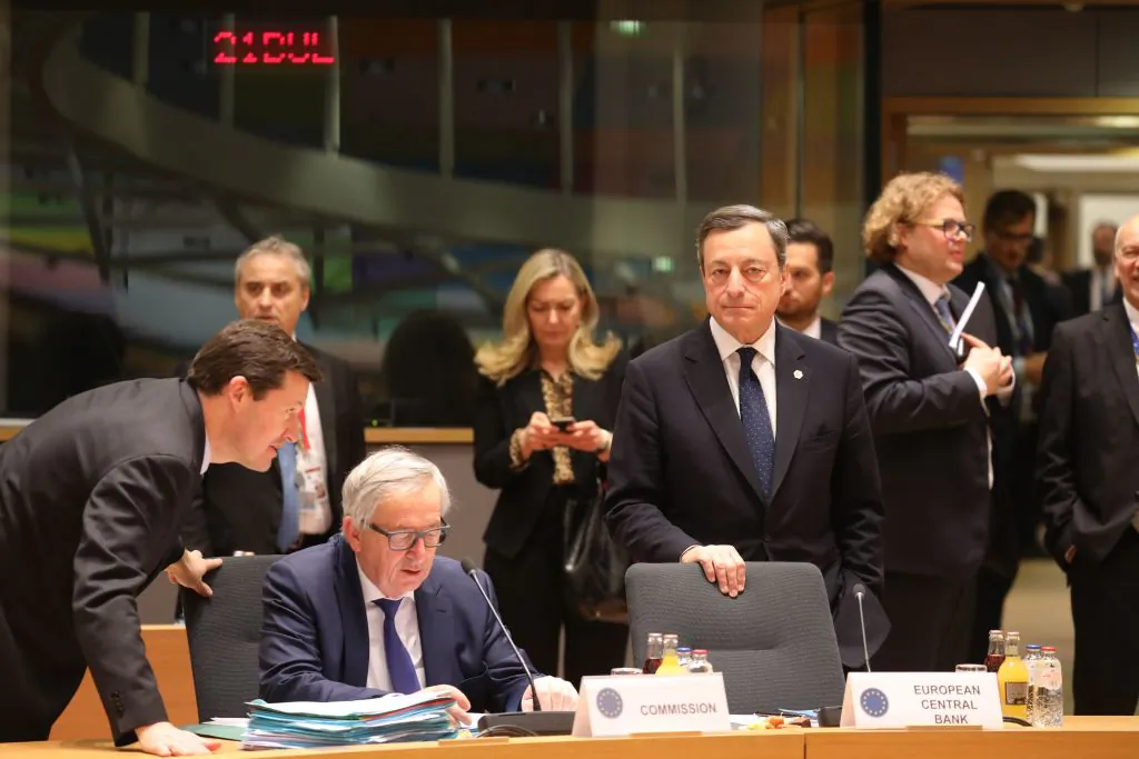 European Central Bank (BCE) President Mario Draghi (R) stands next to European Commission President Jean-Claude Juncker (2L) flanked by newly appointed Secretary General of the Commission Martin Selmayr during a meeting on the second day of a summit of European Union (EU) leaders at the European Council headquarter in Brussels, on March 23, 2018.
EU leaders on March 23 adopted negotiating guidelines for talks on the future relationship with Britain, European Council President said.
/ AFP PHOTO / Ludovic MARIN (Photo credit should read LUDOVIC MARIN/AFP/Getty Images)