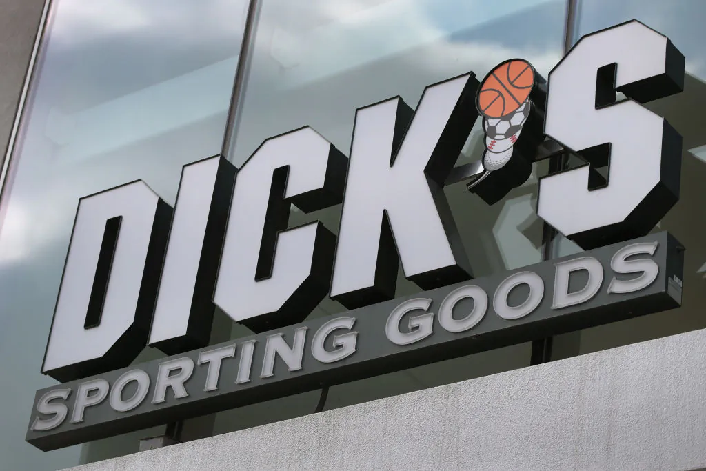 A sign hangs outside of a Dick's Sporting Goods store on February 28, 2018 in Chicago, Illinois. (Photo by Scott Olson/Getty Images)