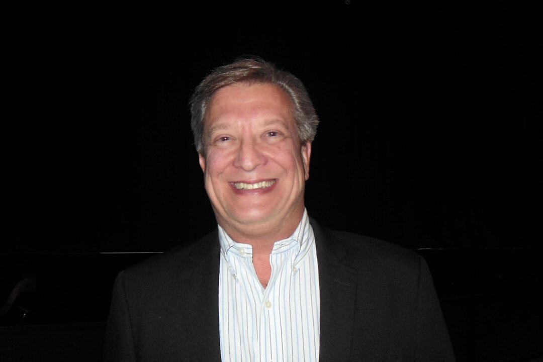Michael Chmura, principal at Bellofera Group LLC, enjoyed the Shen Yun performance at the Popejoy Hall in Albuquerque, N.M., on March 5, 2018. (Sherry Dong/The Epoch Times)