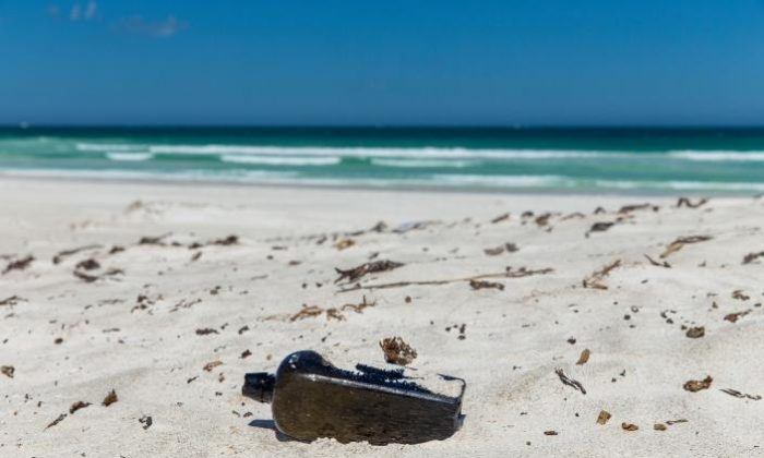 The oldest known message in a bottle discovered at Wedge Island, Western Australia. (KymIllman.com)