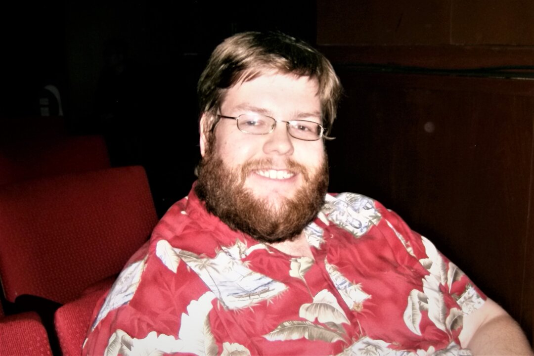 Keith Weber, a software engineer at Duke City Software and an adjunct professor at the University of New Mexico in the Computer Science Department, enjoyed the Shen Yun performance at the Popejoy Hall in Albuquerque, N.M., on March 6, 2018. (Yuli Li/The Epoch Times)