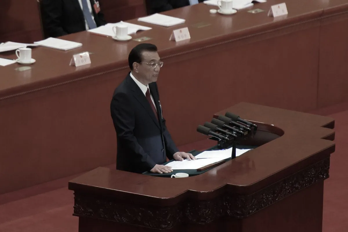 Chinese Premier Li Keqiang delivers a speech during the opening session of China's rubber-stamp legislature, the National People's Congress, at The Great Hall of People in Beijing on March 5, 2018. (Etienne Oliveau/Getty Images)