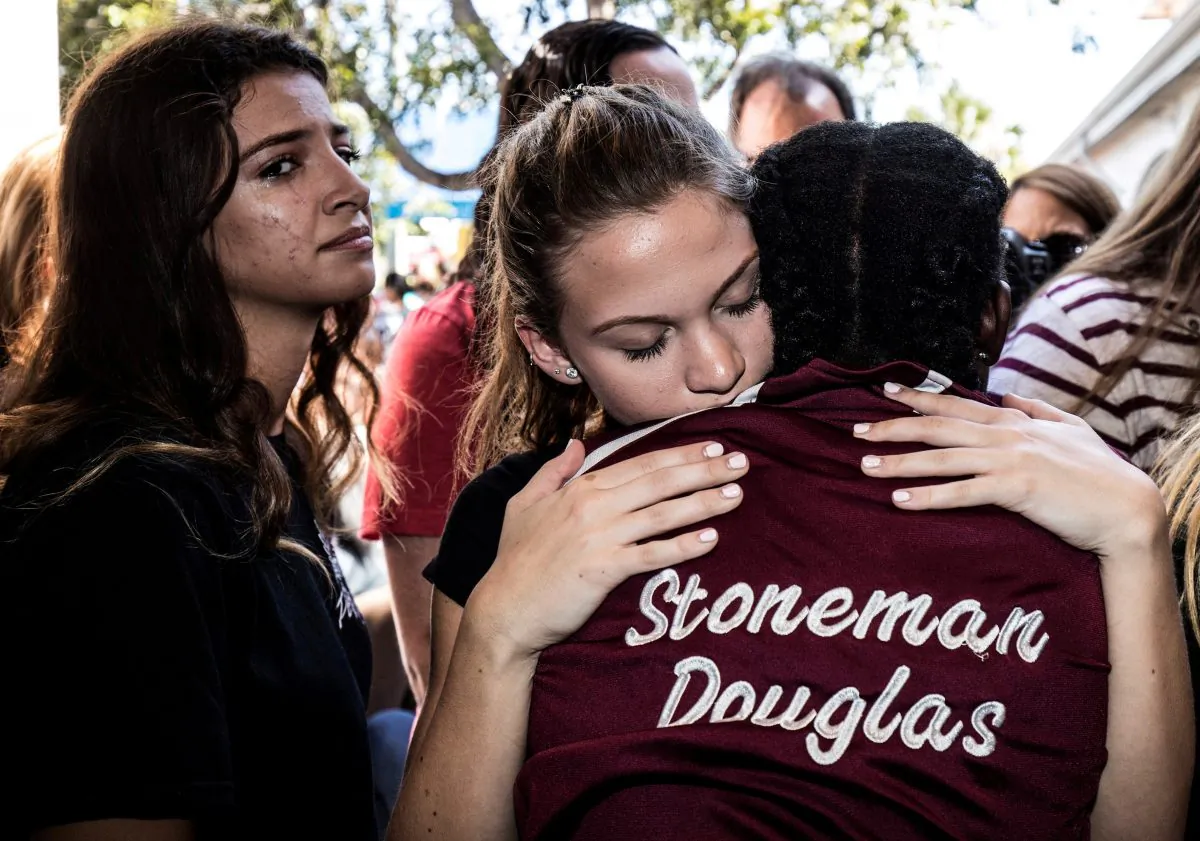 Students from Marjory Stoneman Douglas High School attend a memorial following a school shooting incident in Parkland, Florida, U.S., Feb. 15, 2018.  (Reuters/Thom Baur/File Photo)