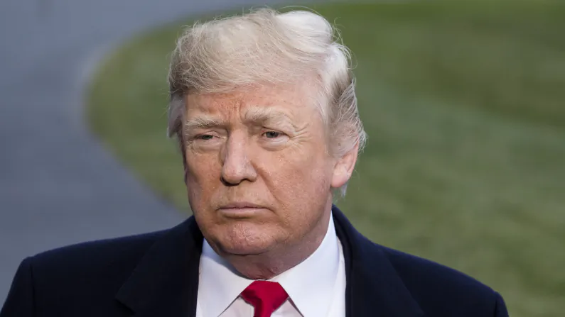President Donald Trump speaks to reporters before leaving the White House en route to Camp David, Md., on Dec. 15, 2017. (Samira Bouaou/The Epoch Times)