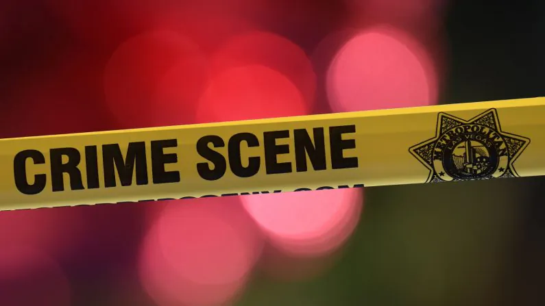 File photo of crime scene tape. (Mark Ralston/AFP/Getty Images)