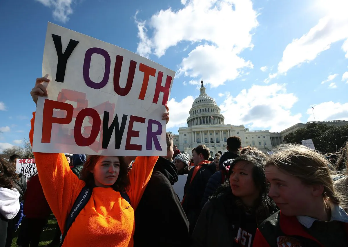 Seventeen-year-old Annie McCasland of Potomac, Maryland holds up a sign during a rally at the U.S. Capitol to urge Congress to take action against gun violence on March 14, 2018 on Capitol Hill in Washington, DC. The protest marked one month since a gunman killed 17 people at Marjory Stoneman Douglas High School in Parkland, Florida.  (Mark Wilson/Getty Images)
