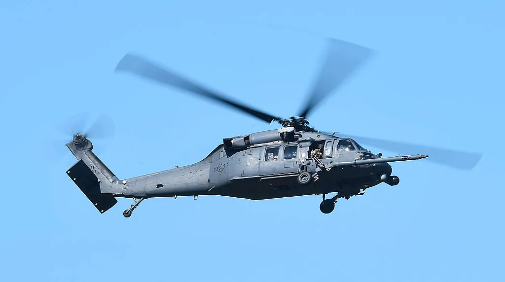 A U.S military HH-60 Pave Hawk Helicopter is seen flying over a simulated crash site during Exercise Angel Reign on July 1, 2016 in Townsville, Australia. (Ian Hitchcock/Getty Images)