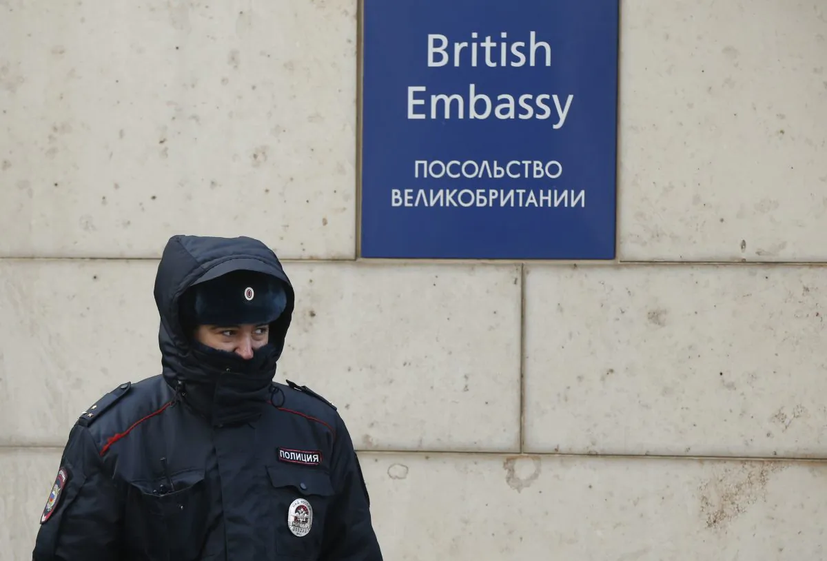 A Russian policeman walks outside the British embassy in Moscow, Russia, March 17, 2018. (Reuters/David Mdzinarishvili)