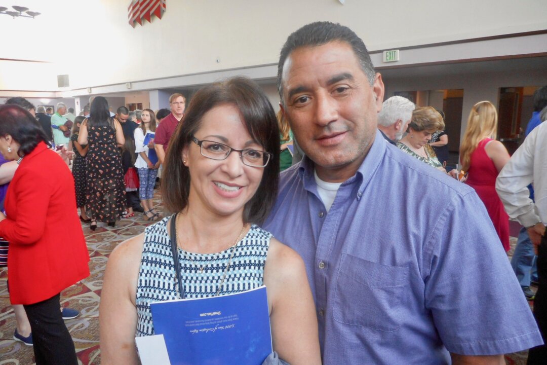 Nilsa Hernandez (L) and Eddie Hernandez attended Shen Yun’s afternoon performance at the RP Funding Center (formerly Lakeland Center), in Lakeland, Fla., on March 18, 2018. “It’s very colorful and beautiful. … It really gets your attention,” Mrs. Hernandez said. (Edie Bassen/The Epoch Times)