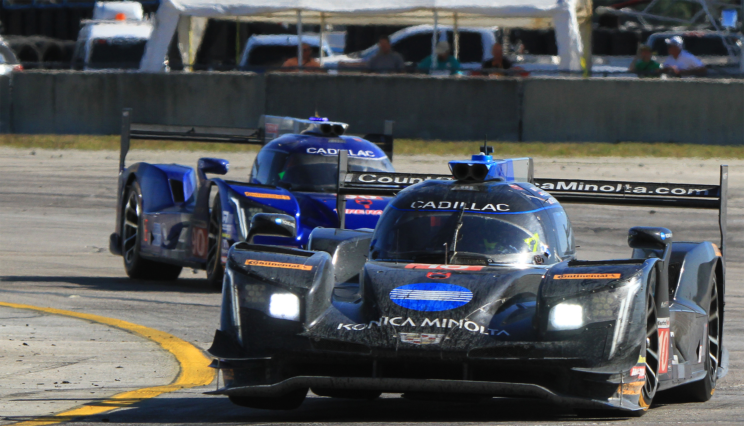 The #10 WTR Cadillac DPi gets two wheels in the air coming through Turn 17. The bumps at Turn 17 caused a couple of wrecks at the 2018 12 Hours. Cars can bounce sideways as well as up and down—that’s how the #6 Acura got knocked out, and the Frank Montecalvo in the #64 Scuderia Corsa Ferrari ended up on its roof after hitting the spinning #52 AFS/PR1 Ligier. (Chris Jasurek/Epoch Times)