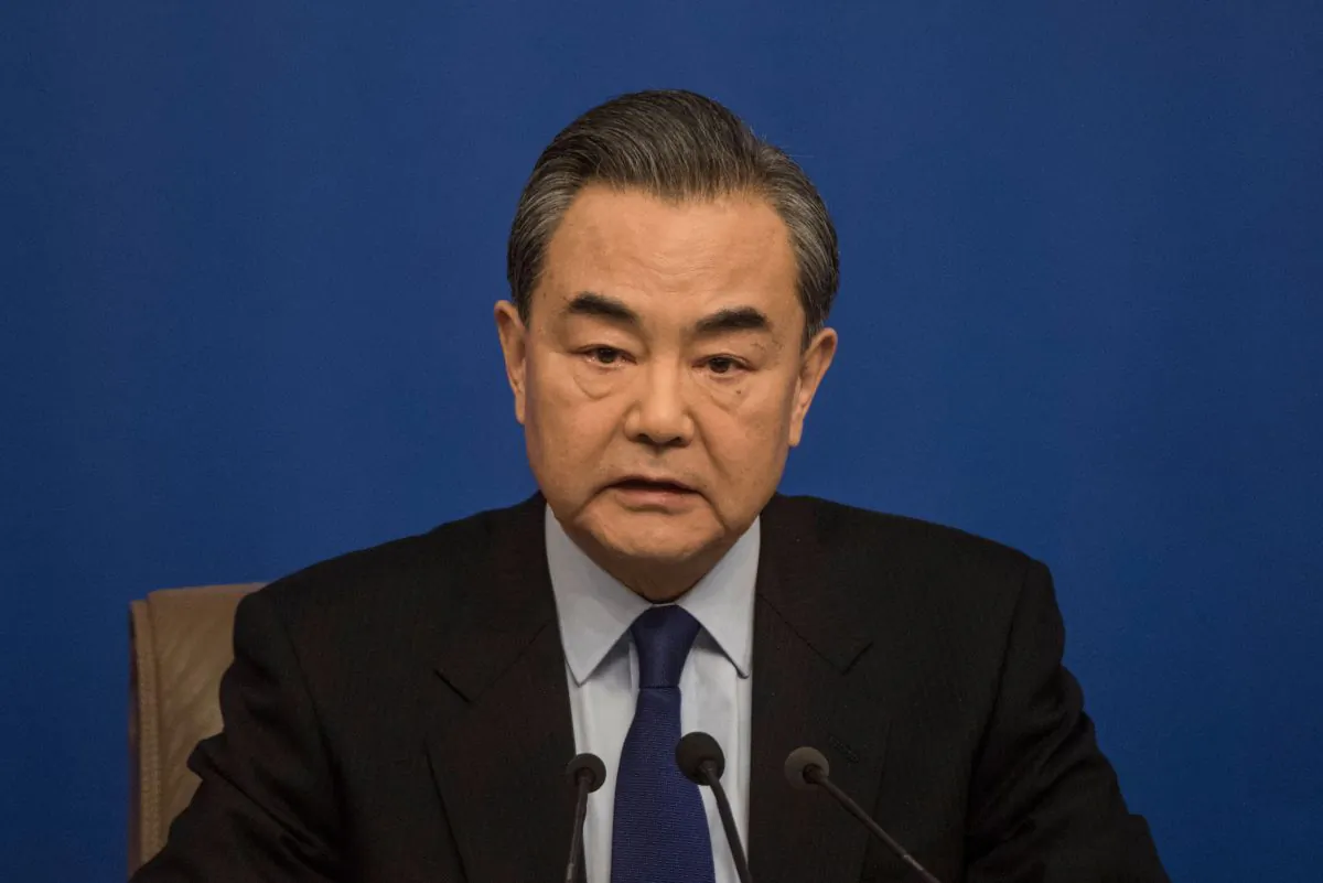 China's Foreign Minister Wang Yi attends a press conference during a session of China's rubber-stamp parliament, the National People's Congress, in Beijing, on March 8, 2018. (Fred Dufour/AFP/Getty Images)