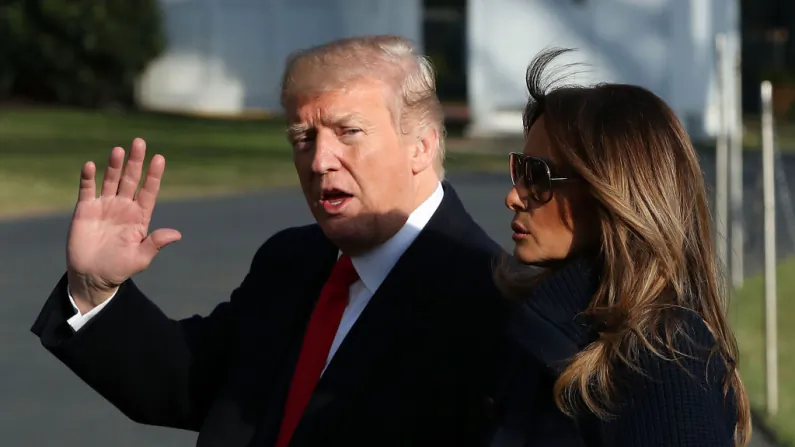 President Donald Trump and first lady Melania Trump arrive at the White House in Washington, DC on March 19, 2018. (Mark Wilson/Getty Images)
