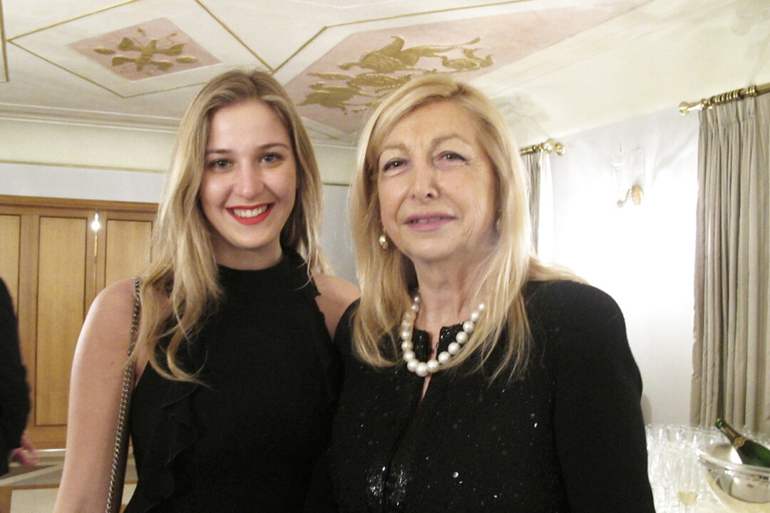 Daniela Traldi (R) and her companion enjoyed Shen Yun Performing Arts at the Teatro dell’Opera di Roma, in Rome, Italy, on March 19, 2018. (Mary Mann/The Epoch Times)