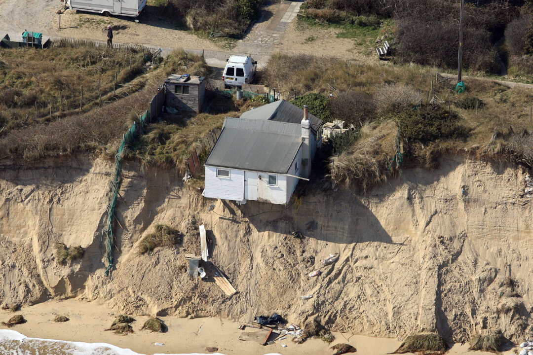 Jaw-Dropping Drone Footage Shows Homes Teetering on Cliff Edge After ...