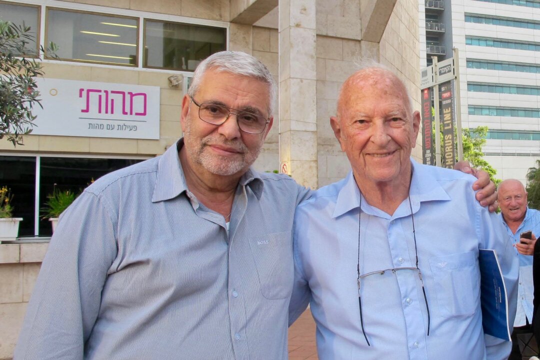 Yossi Marek (L), president of MATAT, an Israeli NGO, and his companion enjoyed Shen Yun Performing Arts at The Opera House in Tel Aviv, Israel, on March 27, 2018. (Mary Man/The Epoch Times)