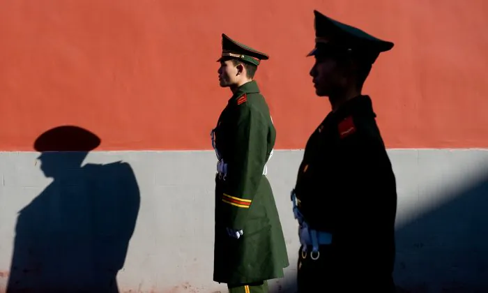 Members of the Chinese police stand guard in Beijing, China, on Nov. 17, 2009. (Saul Loeb/AFP/Getty Images)