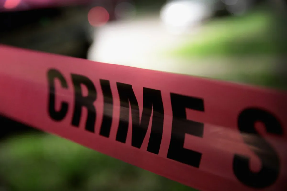 Crime scene tape is stretched around the front of a home in Chicago in a file photo. (Scott Olson/Getty Images)