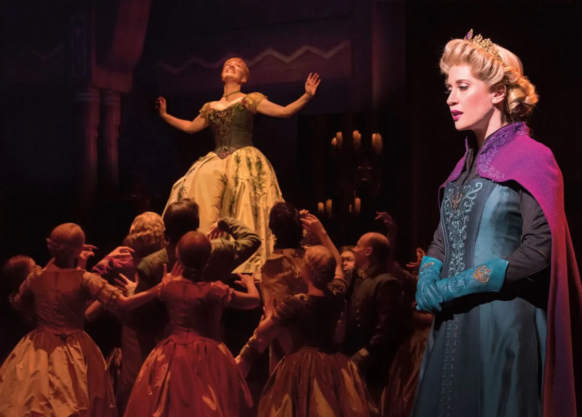 Anna (Patti Murin, L), Elsa (Caissie Levy) and the company of “Frozen.” (Deen van Meer)