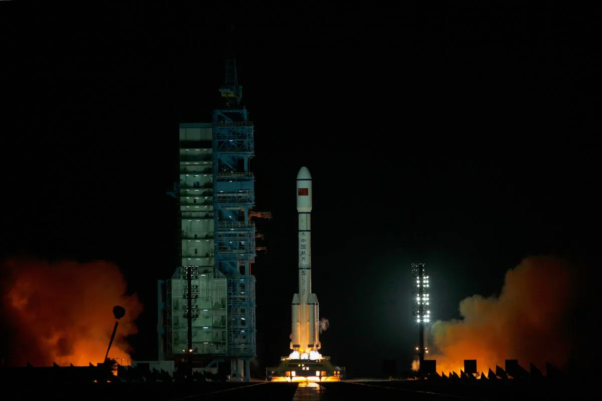 A Long March 2F rocket carrying the country's first space laboratory module Tiangong-1 lifts off from the Jiuquan Satellite Launch Center on September 29, 2011 in Jiuquan, Gansu province of China. (Photo by Lintao Zhang/Getty Images)