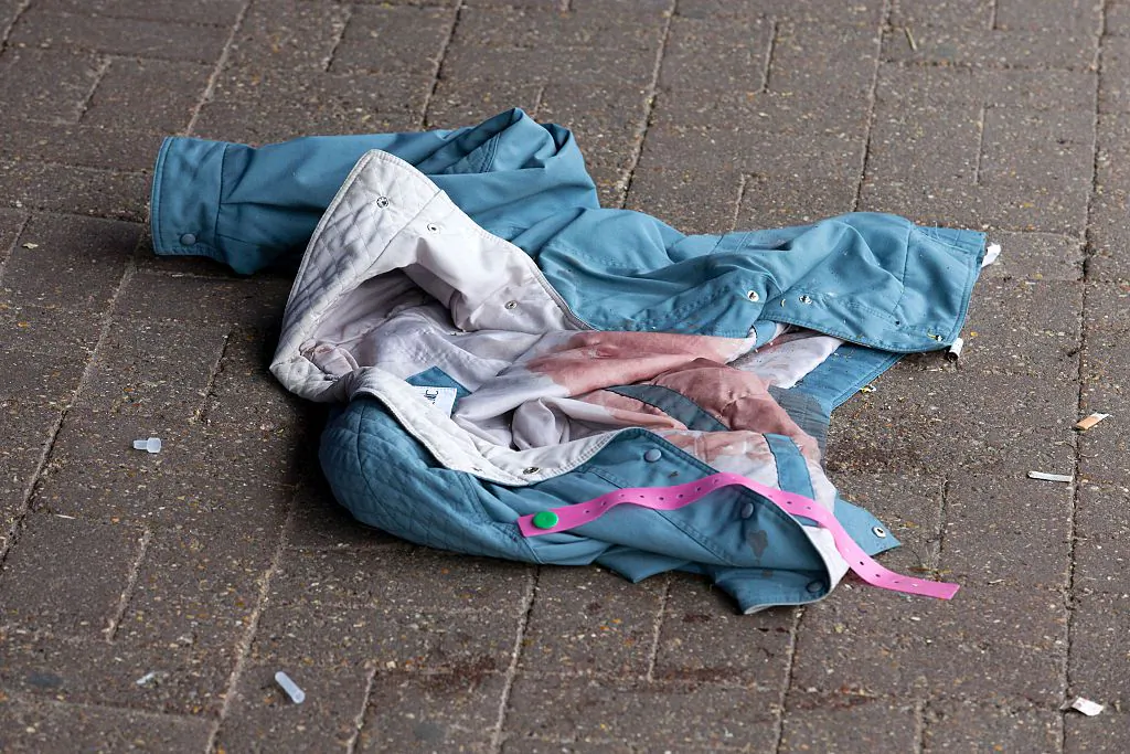 A jacket is pictured outside a Sainsbury's shopping store in west London, on May 20, 2016, after a man was arrested following the stabbing of four women. (JUSTIN TALLIS/AFP/Getty Images)