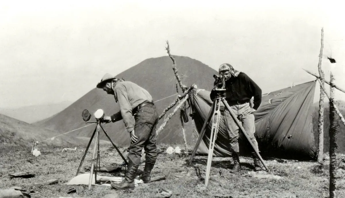 Surveyors mapping the boundary at the Yukon-Alaska border circa 1907. The line was supposed to be as straight as possible, despite running through uncharted wilderness in many regions. (JD Craig/International Boundary Commission)