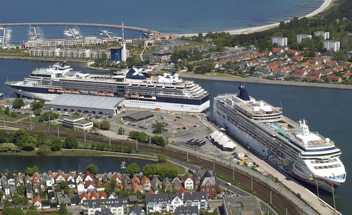 The Norwegian Jewel, right, a Norwegian Cruise Lines ship, is seen in Warnemuende, northern Germany, in this file photo. (AP Photo/Thomas Haentzschel)