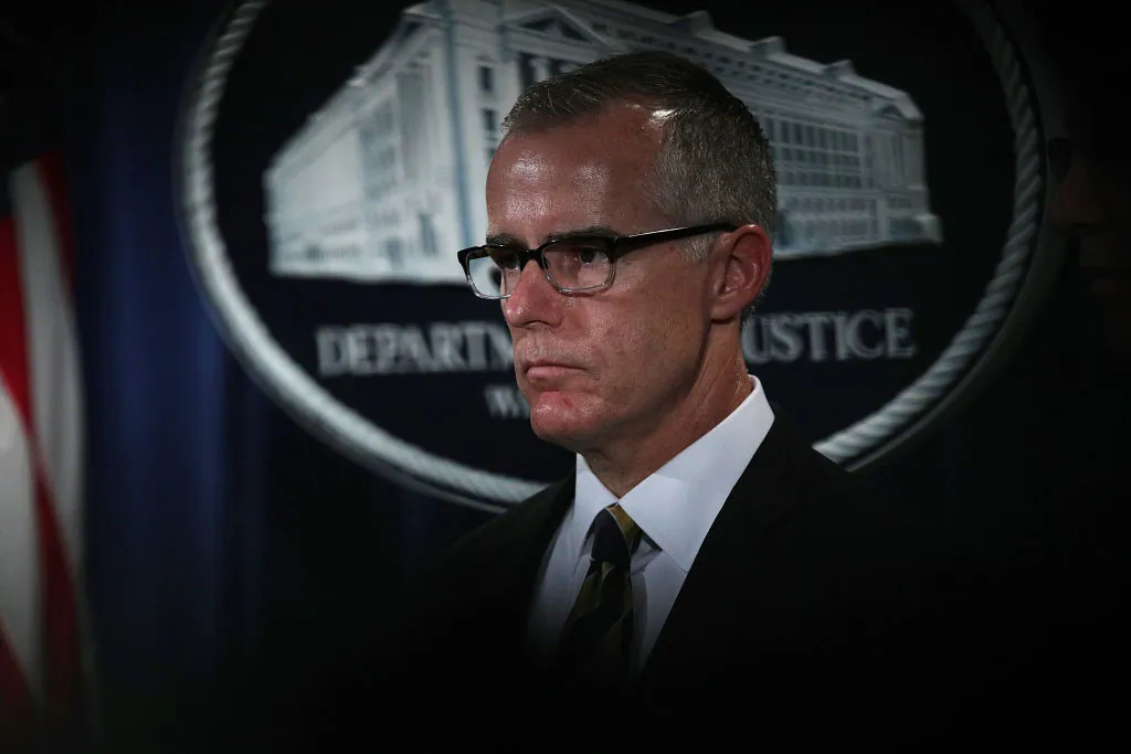 Acting FBI Director Andrew McCabe listens during a news conference to announce significant law enforcement actions July 13, 2017 at the Justice Department in Washington, DC.  (Photo by Alex Wong/Getty Images)