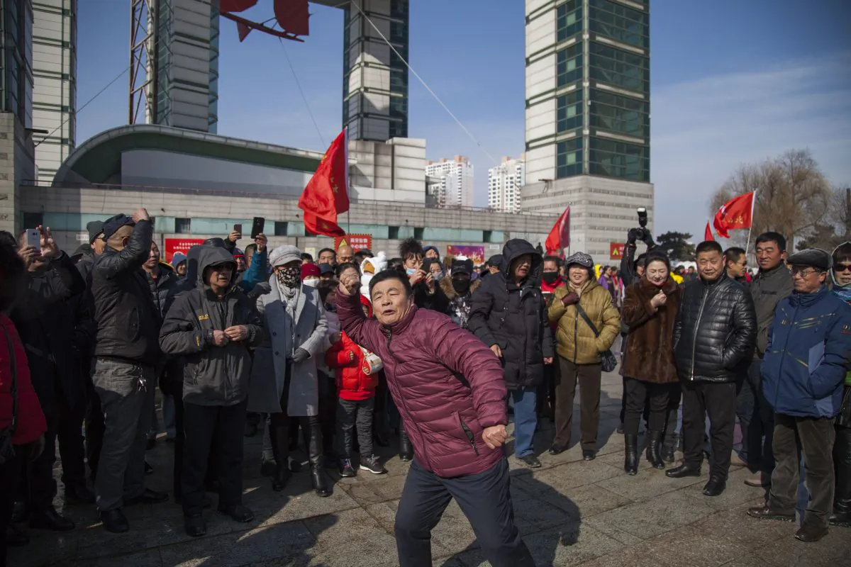 Residents call for a boycott of South Korean goods in northeast Jilin Province, China, on March 5, 2017. (STR/AFP/Getty Images)