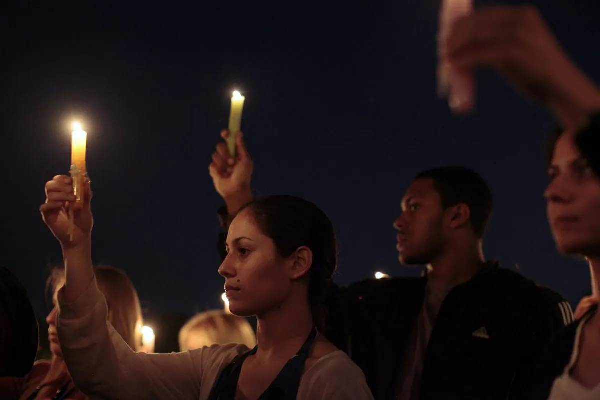 Students and visitors attend a candlelight vigil on campus at Virginia Tech April 16, 2012 in Blacksburg, Virginia. (Jared Soares/Getty Images)