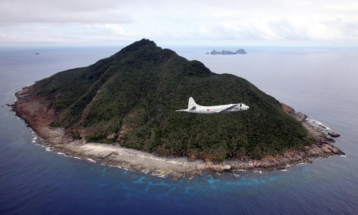 A P-3C maritime patrol aircraft of the Japanese Maritime Self-Defense Force flying over the disputed Senkaku Islands in the East China Sea on Oct. 13, 2011. (Japan Pool/AFP/Getty Images)