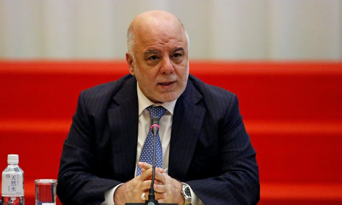 Iraqi Prime Minister Haider al-Abadi speaks during the Tokyo Conference on Supporting Job Creation and Vocational Training to Facilitate Weapons Reduction for Iraqi Society in Tokyo, Japan, April 5, 2018. (Reuters/Toru Hanai)