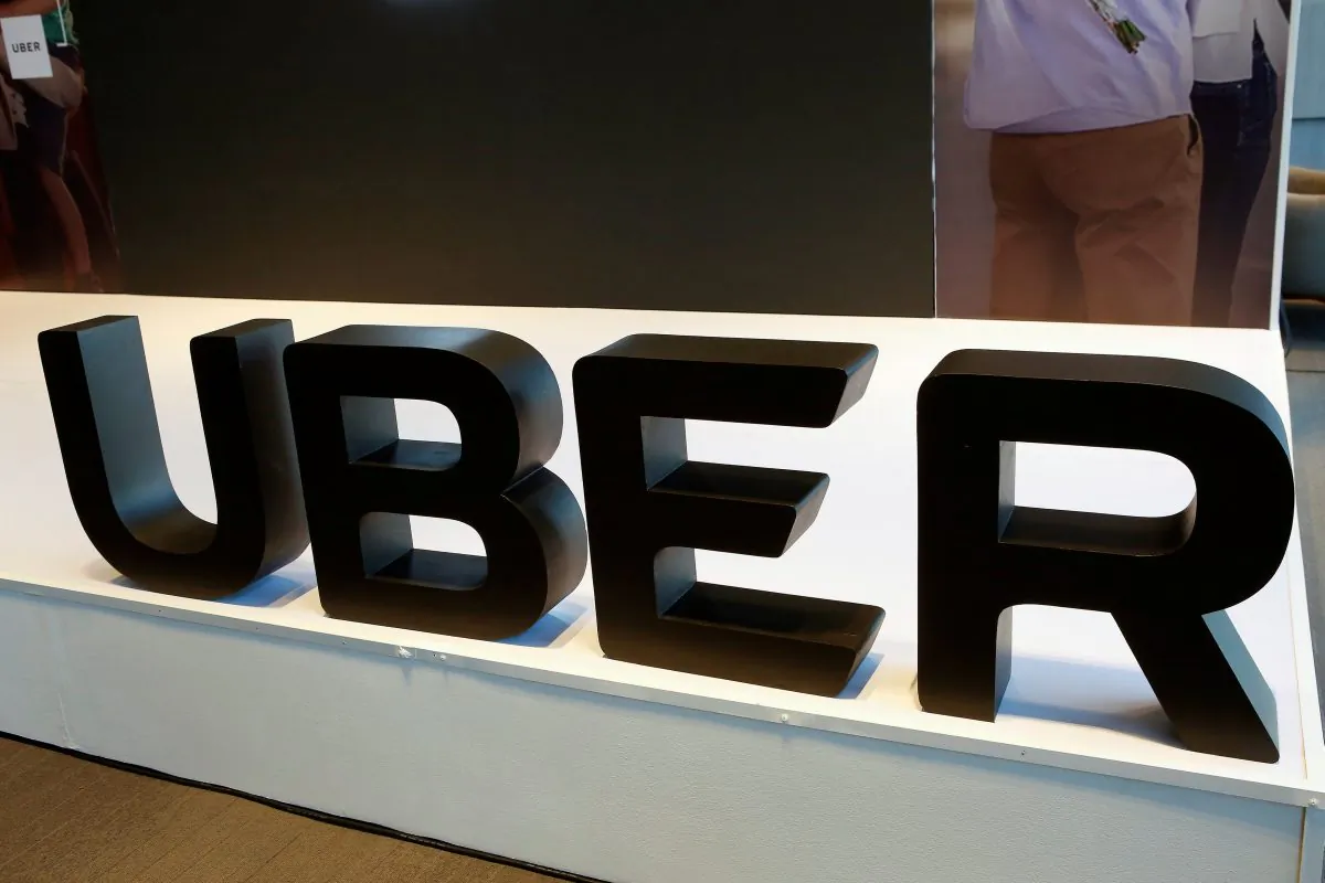 The logo of Uber is pictured during the presentation of their new security measures in Mexico City, Mexico April 10, 2018. (Reuters/Ginnette Riquelme)
