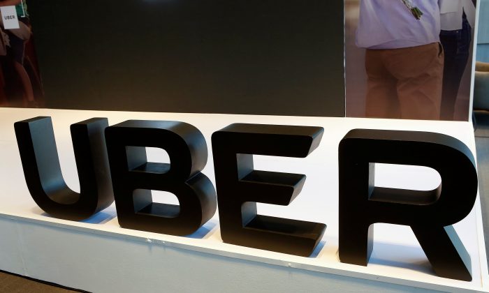 The logo of Uber is pictured during the presentation of their new security measures in Mexico City, Mexico April 10, 2018. (Reuters/Ginnette Riquelme)