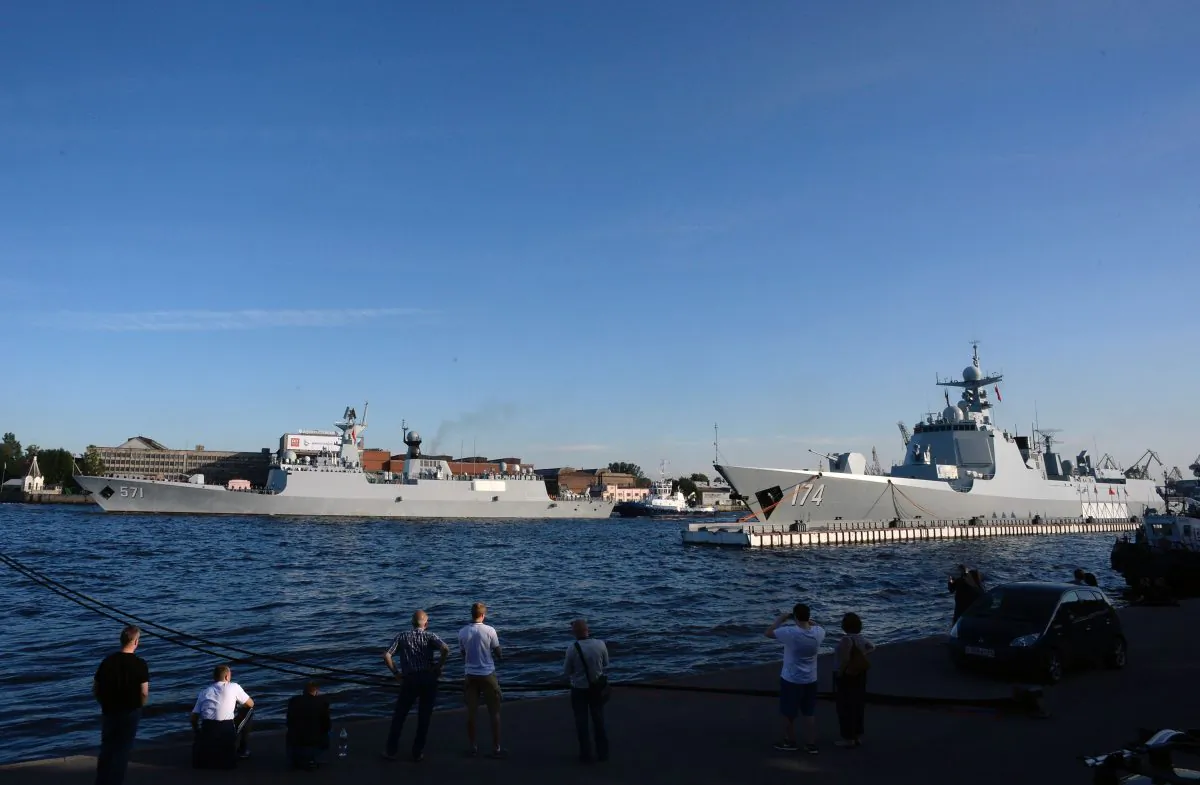 Chinese Type 052D missile destroyer Hefei (R) and Chinese Type 054A frigate Yuncheng docked in Saint Petersburg, Russia, on July 27, 2017. (Olga Maltseva/AFP/Getty Images)