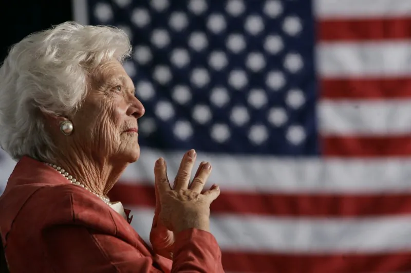 Former U.S. first lady Barbara Bush listens to her son, President George W. Bush, as he speaks at an event on social security reform in Orlando, Florida, March 18, 2005. (Reuters/Jason Reed  JIR/HB)