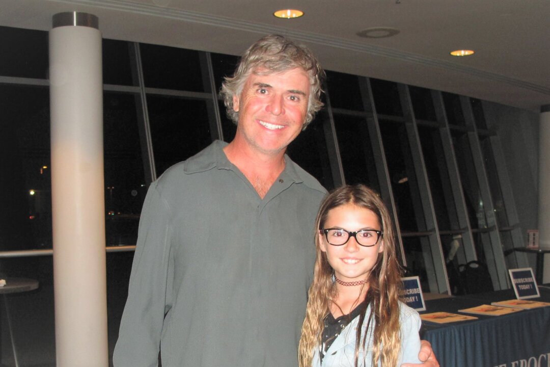 Golf course owner Mike Brown and his daughter Macy, a soprano singer, enjoyed the Shen Yun performance at the Performing Arts Center San Luis Obispo, in San Luis Obispo, Calif., on April 18, 2018. "The dancing just moved me to tears. It was incredible," Ms. Brown said. (Yaning Liu/Epoch Time)