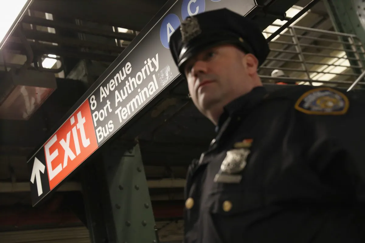 A policeman stands fuard at a closed-off underground walkway near the site of a pipe bomb explosion on Dec. 11, 2017 in New York City. (John Moore/Getty Images)