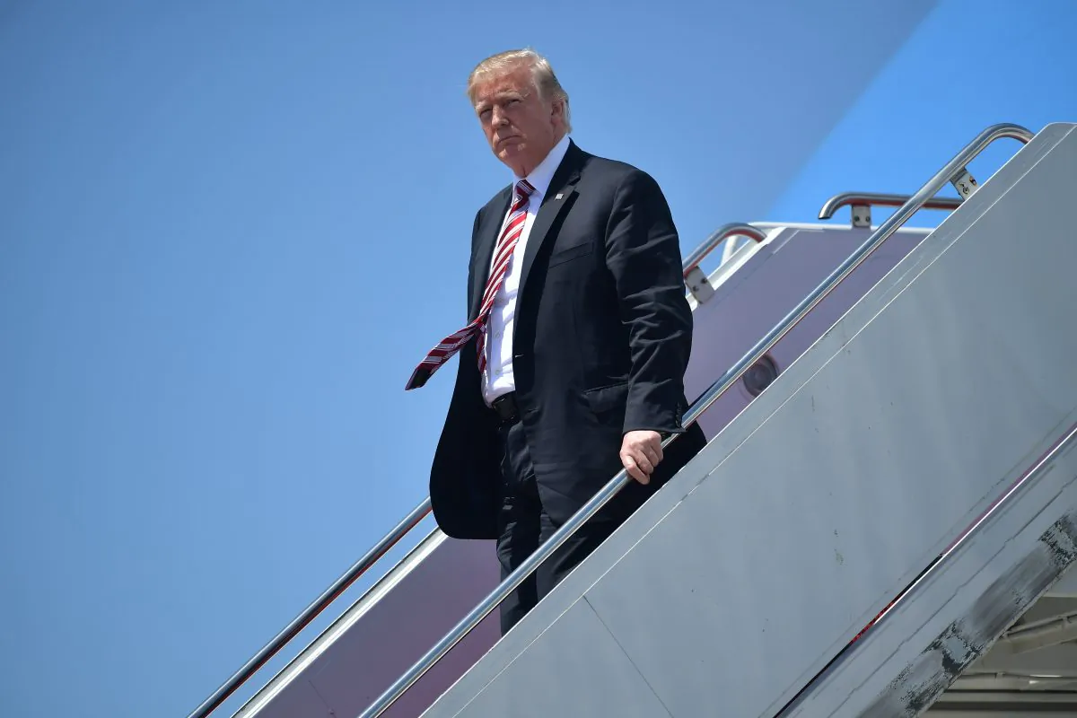 President Donald Trump steps off Air Force One upon arrival at Palm Beach International in West Palm Beach, Florida on April 18, 2018. (Mandel Ngan/AFP/Getty Images)
