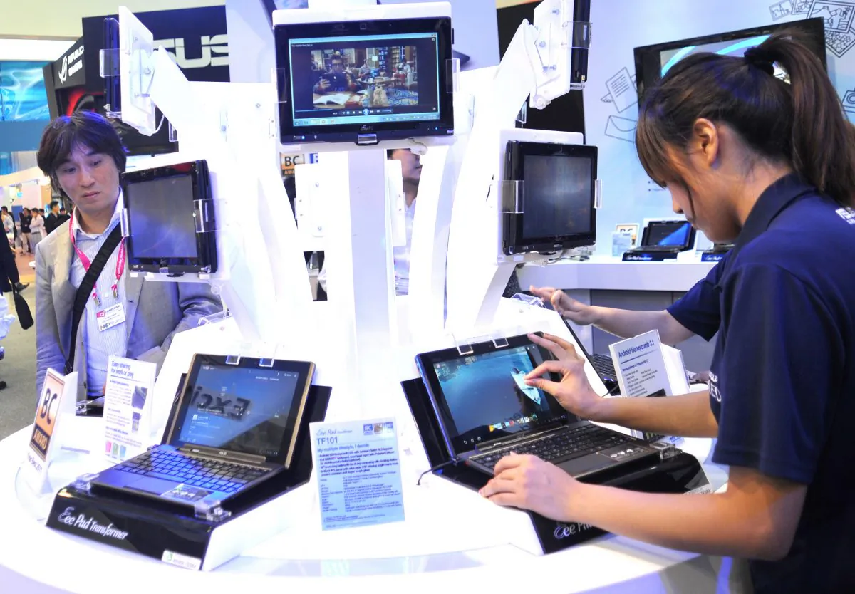 Exhibitors from US tech giant Intel at a booth at Computex Taipei, Asia's biggest information technology and communications trade fair, on May 31, 2011. (Patrick Lin/AFP/Getty Images)