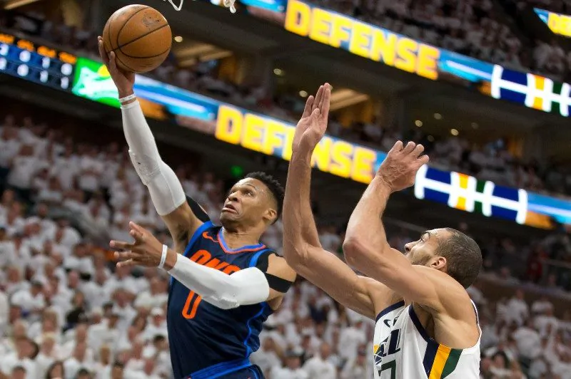 Oklahoma City Thunder guard Russell Westbrook (0) goes up for a shot against Utah Jazz center Rudy Gobert (27) during the first quarter of game four of the first round of the 2018 NBA Playoffs at Vivint Smart Home Arena. (Russ Isabella-USA TODAY Sports)