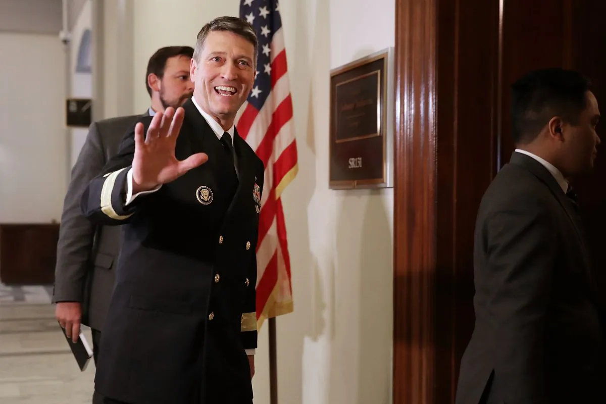 Physician to the President U.S. Navy Rear Admiral Ronny Jackson waves to journalists as he heads into a meeting with Senate Veterans Affairs Committee Chairman Johnny Isakson (R-GA) in the Russell Senate Office Building on Capitol Hill April 16, 2018 in Washington, DC. (Chip Somodevilla/Getty Images)