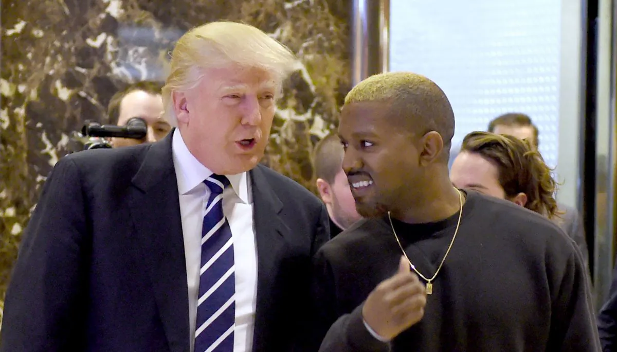 Singer Kanye West and President-elect Donald Trump arrive to speak with the press after their meetings at Trump Tower Dec. 13, 2016 in New York. (TIMOTHY A. CLARY/AFP/Getty Images)