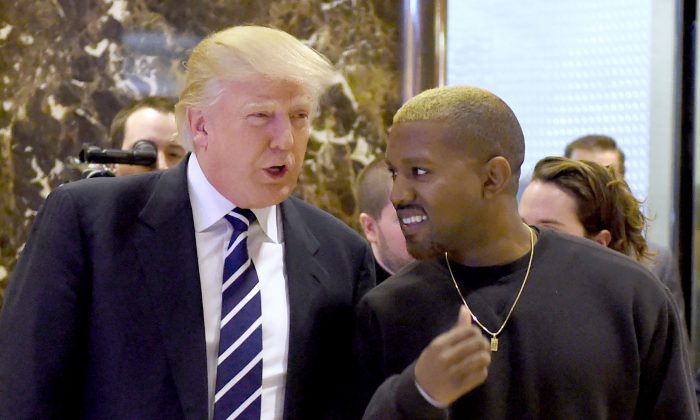 Singer Kanye West and President-elect Donald Trump arrive to speak with the press after their meetings at Trump Tower Dec. 13, 2016 in New York. (TIMOTHY A. CLARY/AFP/Getty Images)