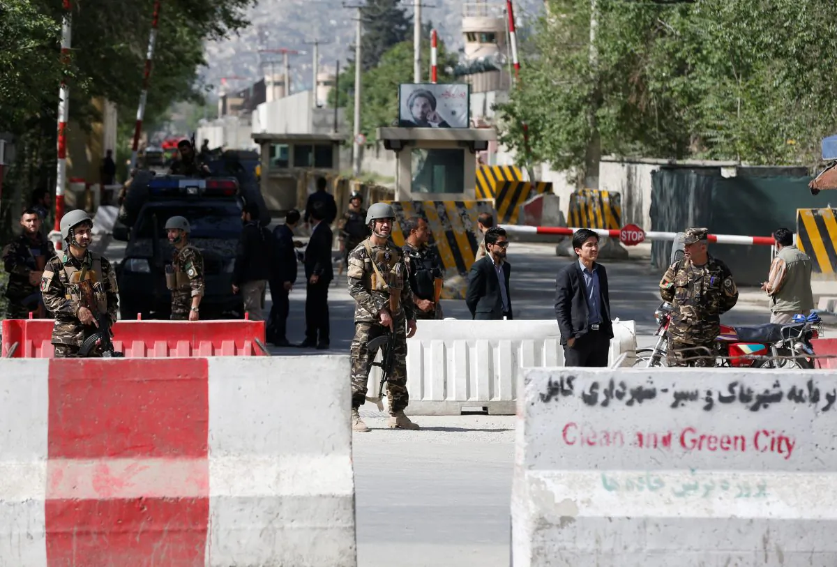 Afghan security forces stand guard near the site of a blast in Kabul, Afghanistan April 30, 2018. (Reuters/Omar Sobhani)