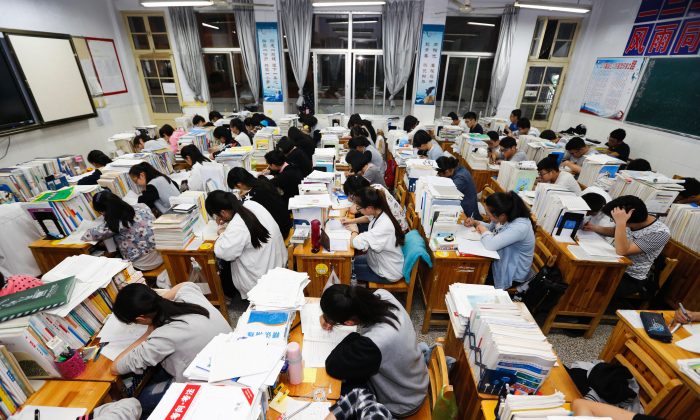 Senior high school students studying at night at a high school in Lianyungang, in east China's Jiangsu Province, on May 24, 2016. (STR/AFP/Getty Images)