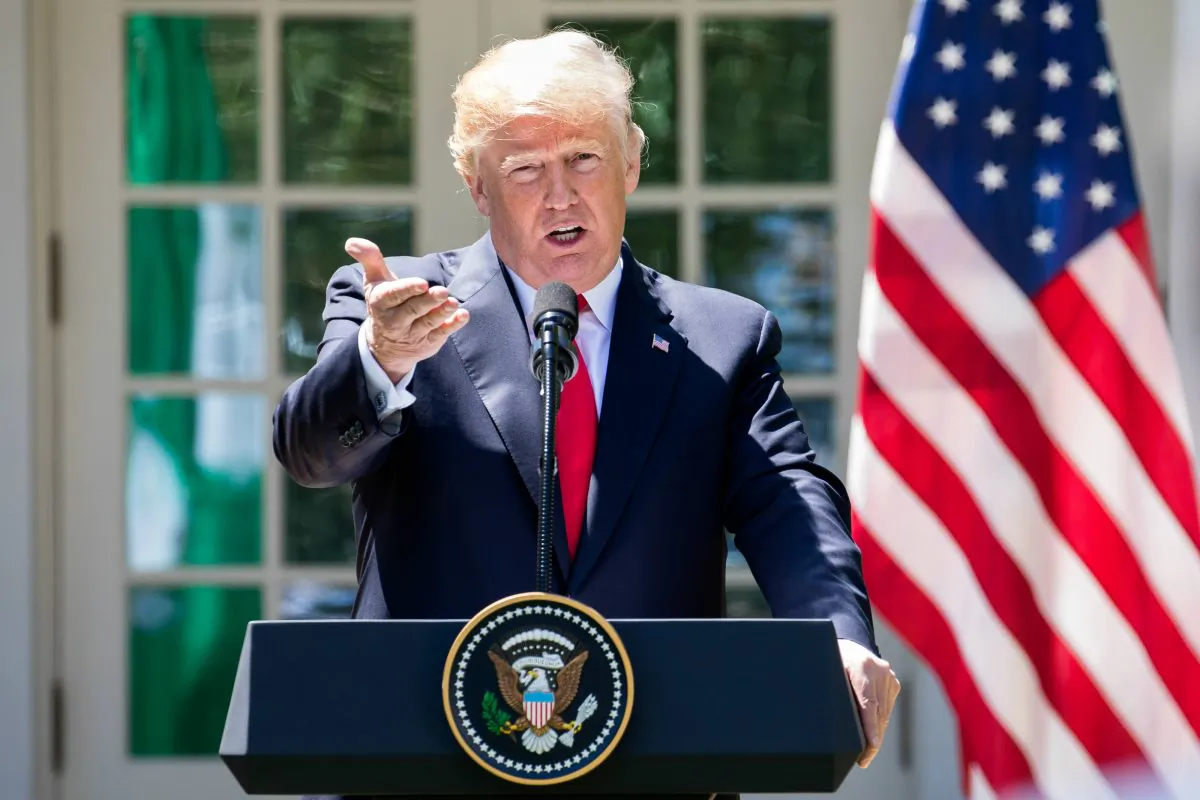 President Donald Trump hosts a joint press conference with President Muhammadu Buhari (not pictured) of the Federal Republic of Nigeria in the Rose Garden of the White House in Washington on April 30, 2018. (Samira Bouaou/The Epoch Times)