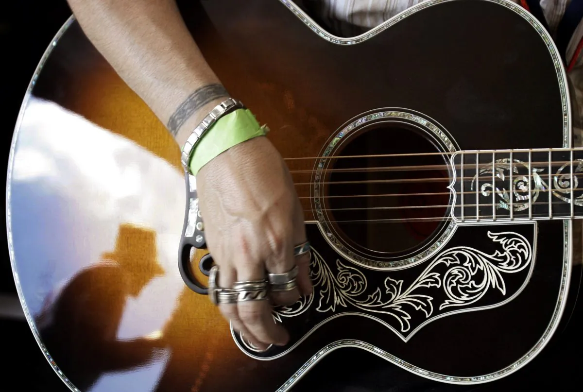 A Gibson acoustic guitar in the Gibson trailer at the annual Newport Folk Festival in Newport, Rhode Island on Aug. 5, 2006. (Brian Snyder/File Photo via Reuters)